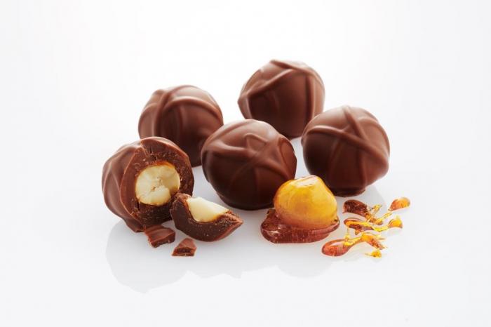 Macadamias that have been roasted in a toffee and then covered in premium chocolate and finished with the Patons swirl.