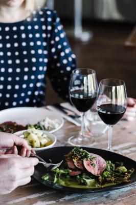The Dining Room experience: Our Dining Room allows you to enjoy beautiful wine with slow roasted meats from the charcoal fire pit.